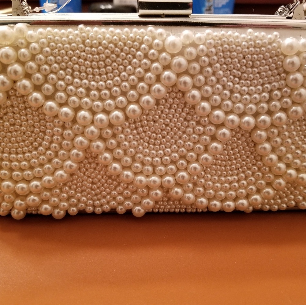 Nina Pearl Clutch used once. Excellent condition.